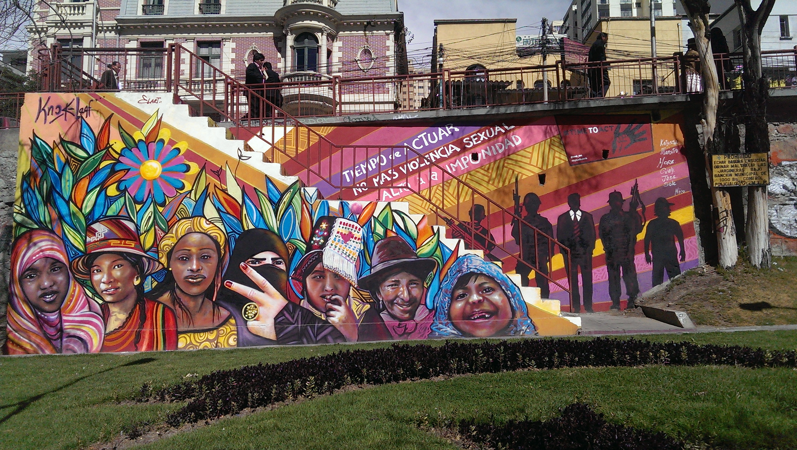 Image of colorful mural with diverse images of women. Text in the mural says: "It is time to act, no more sexual violence. No more impunity"