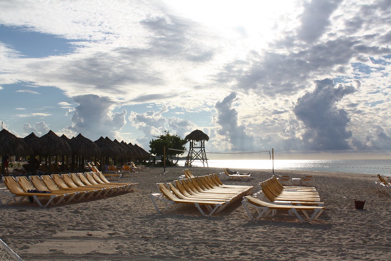 rows of empty beach chairs in Jamaica